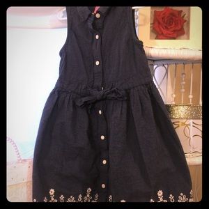 Denim button dress.